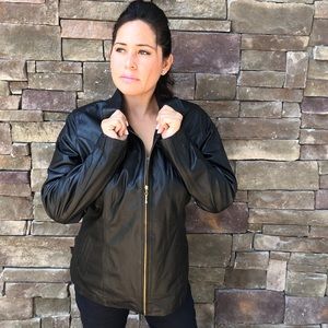 Black genuine leather jacket, made in Ecuador.